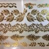 gold tattoo page, leafy